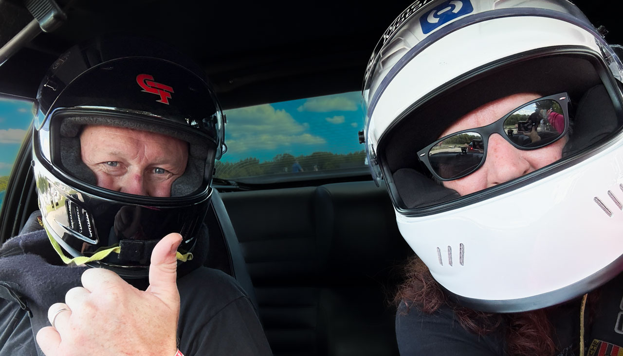 HPDE instructor riding right seat at VIR
